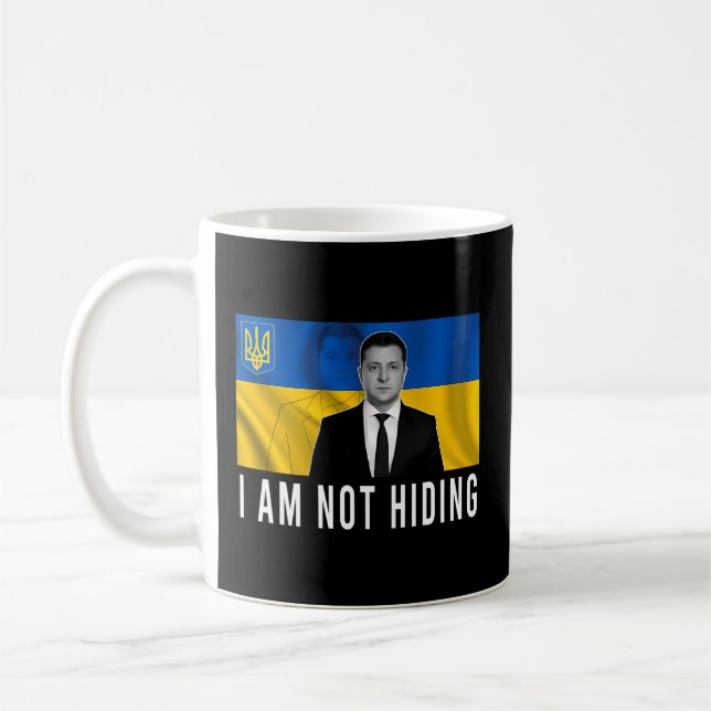 Volodymyr Zelensky I verberge die Unterstützung de Kaffeetasse (Links)