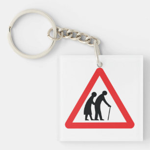 VORSICHT Ältere Menschen - Verkehrszeichen im Vere Schlüsselanhänger