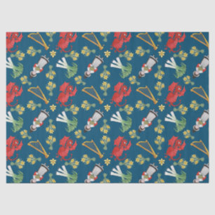 Waliserkostüm und -embleme auf blauem Seidenpapier