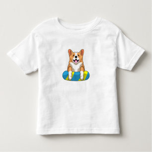 Walisischer Corgi im Schwimmen mit Brett Kleinkind T-shirt