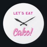 Wall Clock Große Wanduhr<br><div class="desc">Add a sprinkle of sweetness to your space with this fun and playful wall clock! Featuring bold, pink typography and the delicious phrase “LET’S EAT Cake!”, this design is perfect for kitchens, dining rooms, cafés, or anywhere you want to serve up some joy. Whether you're a dessert lover, a baking...</div>