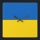 Wall Clock mit der Flagge der Ukraine Quadratische Wanduhr<br><div class="desc">Fügen Sie Ihrer Zuhause oder Ihrem Büro eine unverwechselbare Touch mit unserer exklusiven Wanduhr mit der Flagge der Ukraine hinzu! Die mit viel Liebe zum Detail gestaltete Wanduhr ist mehr als nur ein funktionales Objekt; sie ist ein lebendiger Ausdruck des ukrainischen Stolzes und Erbes. Das auffallende Design zeigt die ikonische...</div>