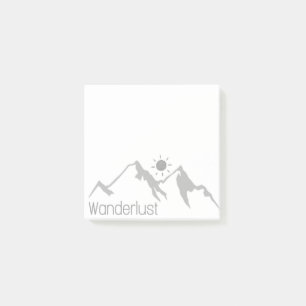 Wandernde Naturberge und Sonne hinterlassen Post-it Klebezettel