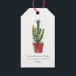 Warm wünscht Cactus Christmas Geschenkanhänger<br><div class="desc">Illustration eines Kaktuskorbs in einem Korb mit einem roten Jungen. Der Kakteen ist mit Weihnachtsschmuck und Weihnachtsbeleuchtung dekoriert und mit einem Stern bedeckt. Im Text steht: "Warme Wünsche" Personalisieren Sie Name und Jahr.</div>
