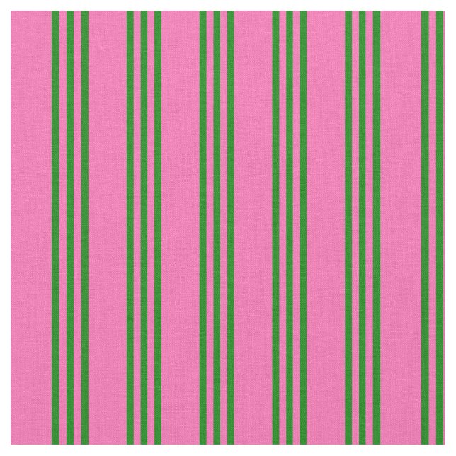 Warmes rosa und grünes, farbiges Muster Stoff (Nahaufnahme)