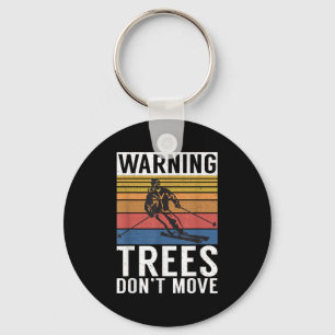 Warnbäume ziehen den Winter-Skiläufer nicht um Schlüsselanhänger