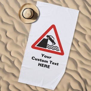 Warnschild am Kai Strandtuch