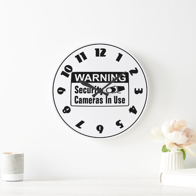 Warnung vor einer Sicherheitskamera in der verwend Große Wanduhr (Von Creator hochgeladen)