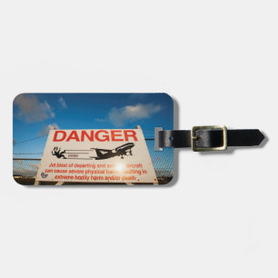 Warnzeichen nahe Flughafen St. Maarten, Gepäckanhänger