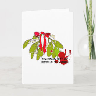 Wart auf Eric unter dem Mistletoe Feiertagskarte