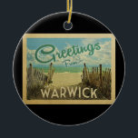 Warwick Beach Vintage Travel Keramik Ornament<br><div class="desc">Dieses Greetings From Warwick Vintage Postcard Design verfügt über einen Sandstrand mit einem schönen türkisfarbenen Ozean Wasser und über dem Meer,  einem blauen Himmel mit billigen weißen Wolken. Im Vintage Reisen Stil.</div>