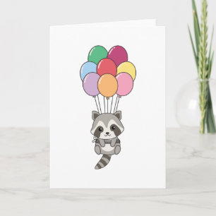 Waschbär fliegt mit bunten Luftballons hoch Karte