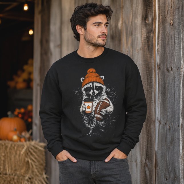 Waschbär-Fußball-Herbstmütze-Kaffee-Grafik Sweatshirt (Von Creator hochgeladen)