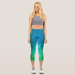 Wasser fällt auf blaues grünes Metall Capri Leggings