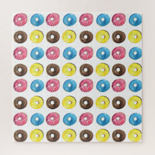 Wasserfarbene kleine Donuts, nahtloses Muster. Puzzle