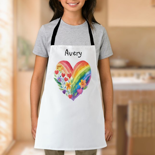 Wasserfarbene Regenbogen-Herz-Personalisierung Schürze (A personalized apron with floral rainbow heart design in a watercolor style, on a white background)