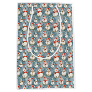 Wasserfarbenschneemänner auf der Blue-Gift-Tasche Mittlere Geschenktüte