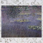 Wasserlilien von Claude Monet, Vintager Impression Puzzle<br><div class="desc">Wasserlilien von Claude Monet sind ein Vintager Impressionismus, ein Kunstmalerei mit Wasserlilien in einem Teich im Garten von Monet auf seiner Zuhause in Giverny, Frankreich. Ein Baum hängt über dem Teich, während der Himmel im Wasser reflektiert. Eine Serie von über 250 Wasserlilien Blume Gemälden, die Monet in den letzten 30...</div>