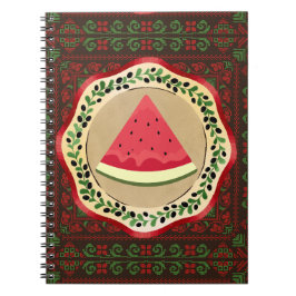 Wassermelone auf Olivenplatte mit palästinensische Notizblock