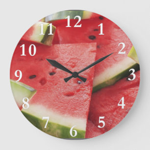 Wassermelone schneidet ringsum Wanduhr