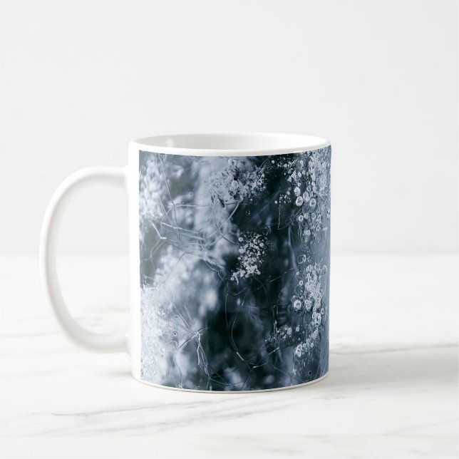 Wasserspritze auf weißem Grund Kaffeetasse (Links)