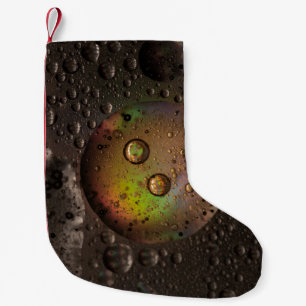 Wassertropfen auf Glasplatte Kleiner Weihnachtsstrumpf