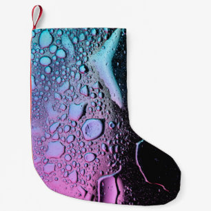 Wassertropfen auf Glasplatte Kleiner Weihnachtsstrumpf