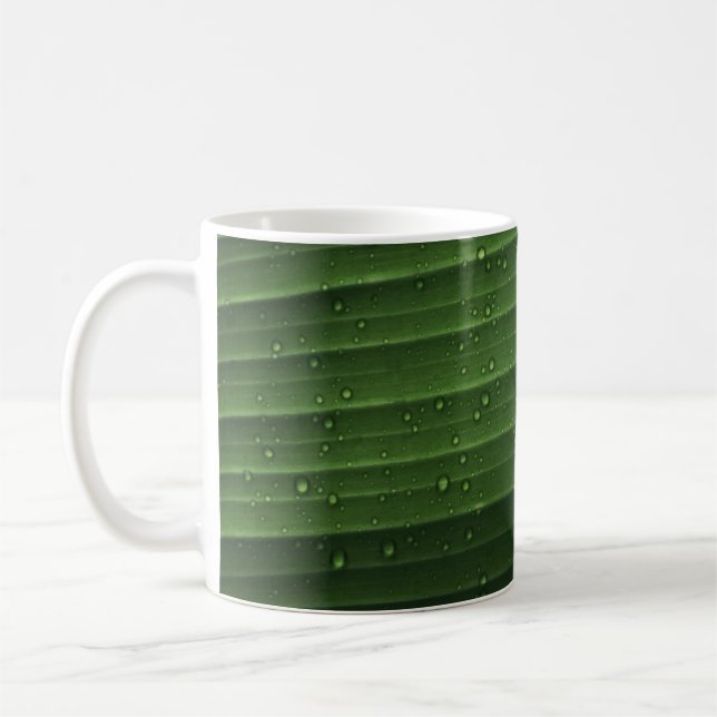 Wassertropfen auf grünem Blatt Kaffeetasse (Links)