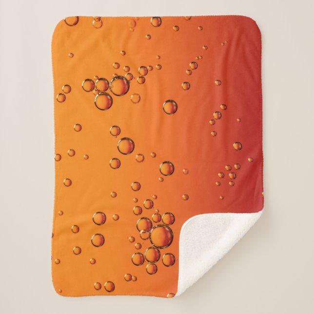 Wassertropfen auf orangefarbener Oberfläche Sherpadecke (Vorderseite)