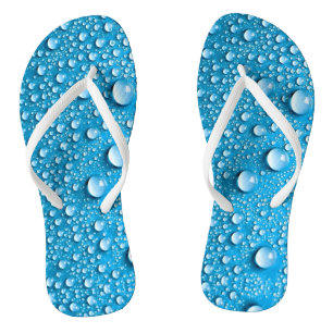 Wassertropfen im Blau des Ozeans Flip Flops