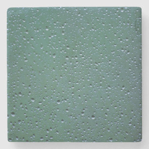 Wassertropfen im grünen Hintergrund Steinuntersetzer