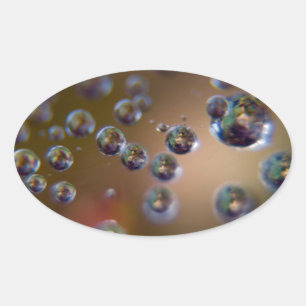 Wassertropfen-Wasser in Bewegung Ovaler Aufkleber