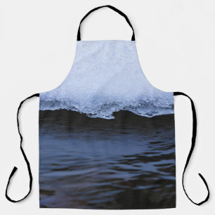 WASSERWELLEN AM UFER SCHÜRZE