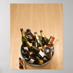 Waste bin full of empty champagne bottles on poster