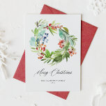 Watercolor Juniper and Holly Wreath Christmas Feiertagskarte<br><div class="desc">Frohe Weihnachten! Senden Sie Ihre Urlaubsbotschaft mit dieser festlichen Weihnachtskarte in Aquarellen an Familie und Freunde. Es verfügt über einen Aquarell mit Winterbeeren und Grünpflanzen. Personalisieren Sie diese botanische Urlaubskarte mit Ihren Daten. Diese Aquarellweihenkarte ist auf anderen Karton erhältlich. Matching-Elemente sind verfügbar.</div>