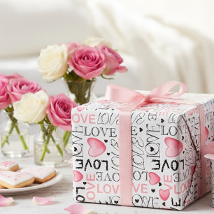 Watercolor-Liebesmanuskript und rosa Herzen Valent Geschenkpapier