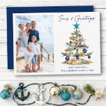 Watercolor Tree Seas and Greetings Photo Beach Feiertagskarte<br><div class="desc">Modern Minimalist Elegance Calligraphy Ink Pen Handwritten Script Seas & Greetings Coastal Holiday Card includes a Watercolor Christmas Tree make of beach ocean driftwood,  seashells,  sand dollars,  nautical anchor ornament and topped with a starfish. Navy Blue Text. Photo Front.</div>