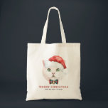 Watercolor White British Kurzhaar Cat Holiday Tragetasche<br><div class="desc">Fröhlich und hell! Feiern Sie den Urlaub mit diesem niedlichen Katzenmotiv Tasche. Es zeigt Aquarellbilder einer weißen Britischen Kurzhaarkatze mit einer Weihnachtsmannmütze und einer Weihnachtsbogen-Krawatte. Personalisieren Sie diese durch Hinzufügen von Namen,  Daten oder Nachrichten. Die weiße Britische Kurzhaar-Tasche wird als Weihnachtsgeschenk perfekt sein.</div>