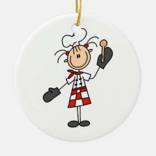 Weiblicher Koch mit Mitten und hölzernem Löffel Keramikornament