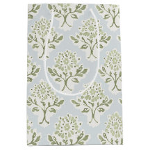 Weicher grüner Blockdruck floral auf Himmelblau