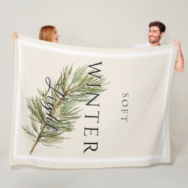 Weiches Winterlicht mit Kiefernzweig Fleecedecke