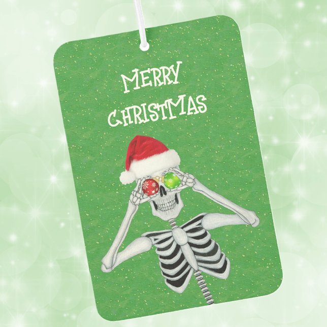 Weihnachten Autolufterfrischer (Funny Skeleton with shiny ornament eyeballs Santa hat on Christmas green car air freshener.)