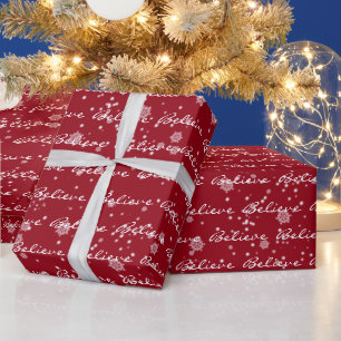 Weihnachten glaubt Text und Schneeflocken Geschenkpapier