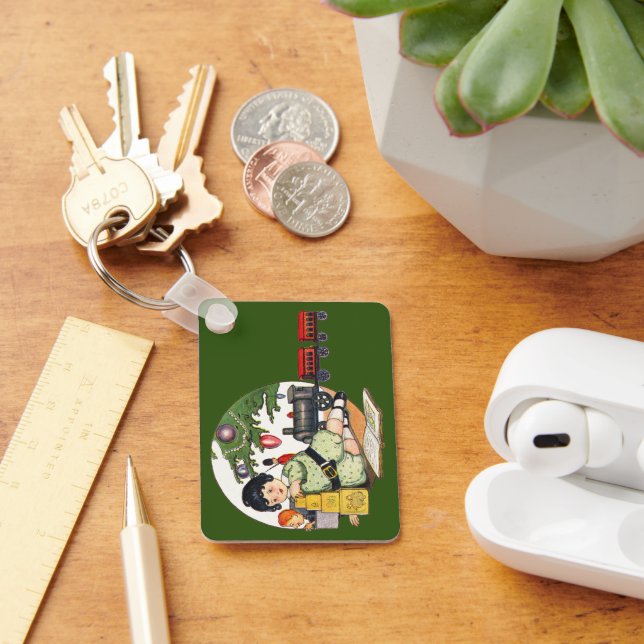 Weihnachten, glücklicher Junge spielen mit Spielze Schlüsselanhänger (Schreibtisch)