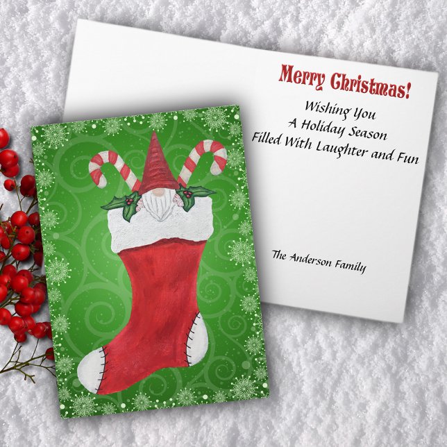 Weihnachten Gnome Candy Canes Holly in Roter Strum (Gnome inside red Christmas stocking with holly leaves candy canes on green swirled Greeting Card.)