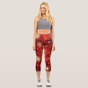 Weihnachten Goldene Schneeflocken im roten Hinterg Capri Leggings