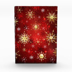 Weihnachten Goldene Schneeflocken im roten Hinterg Fotoblock