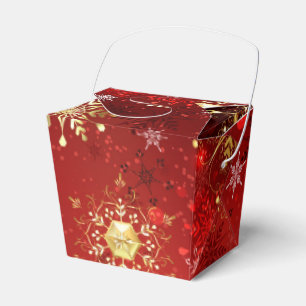 Weihnachten Goldene Schneeflocken im roten Hinterg Geschenkschachtel