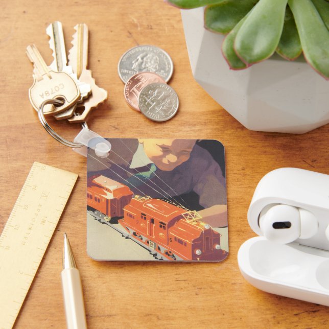 Weihnachten, Junge spielen mit Spielzeugbahnen Schlüsselanhänger (Schreibtisch)