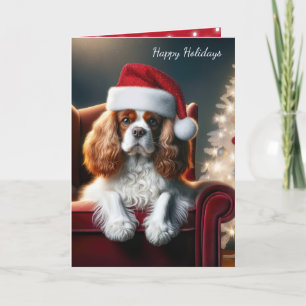 Weihnachten König Charles Spaniel auf einem roten 